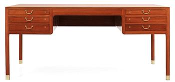 89. An Ole Wanscher mahogany desk by A.J Iversen, Denmark 1950's.