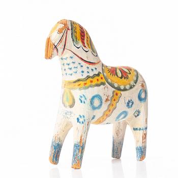 A carved and polychrome painted Dalecarlian horse, first half of the 20th Century.