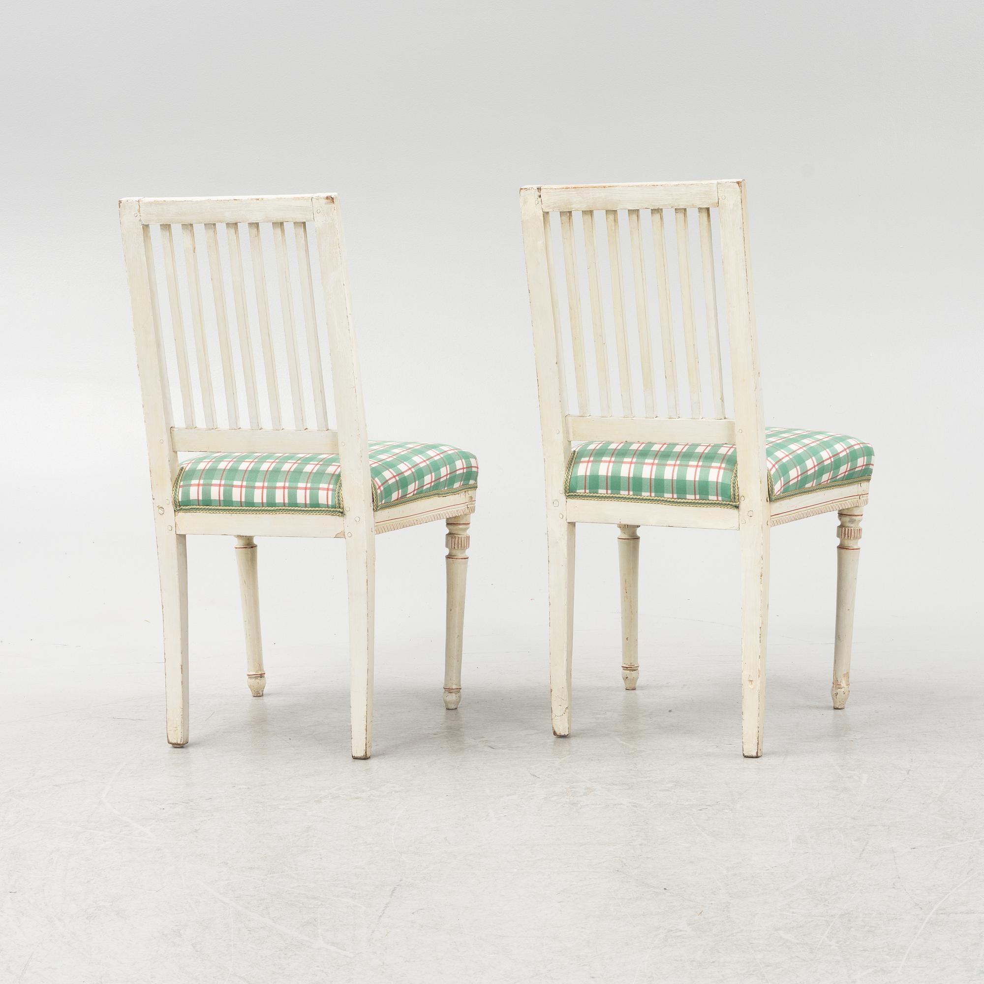A pair of late Gustavian chairs, around the year 1800.