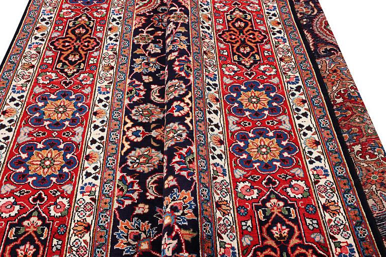 A Meshed carpet, c. 352 x 253 cm.