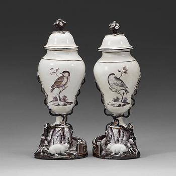 134. A pair of Swedish faience vases with covers, Marieberg, 18th Century.