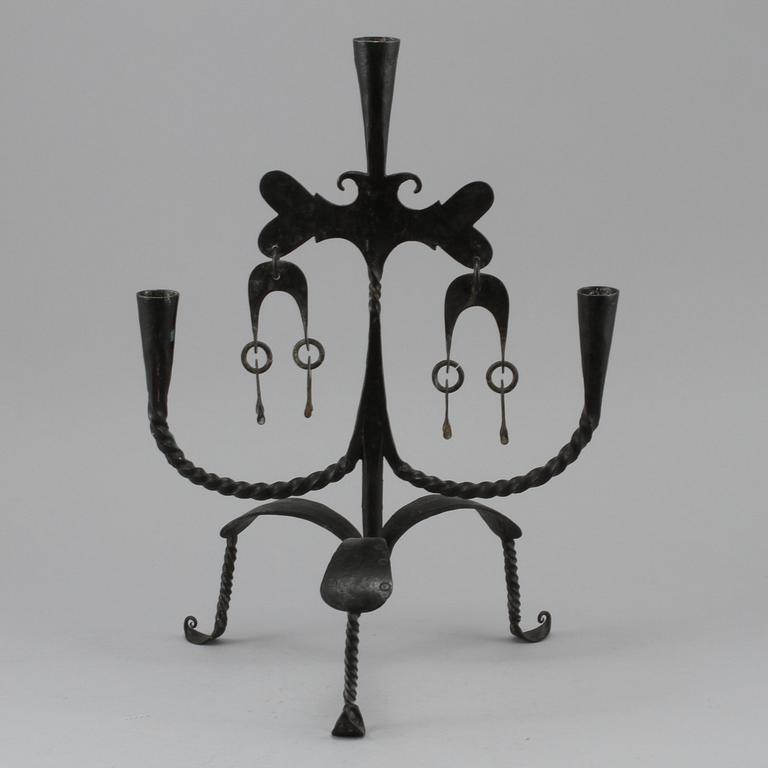 LJUSSTAKE, smide, 1900-tal.
