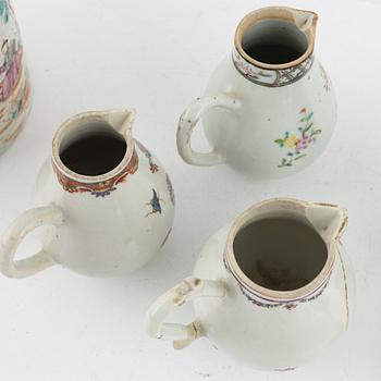 A porcelain mug and four creamers, China, 18th centruy.