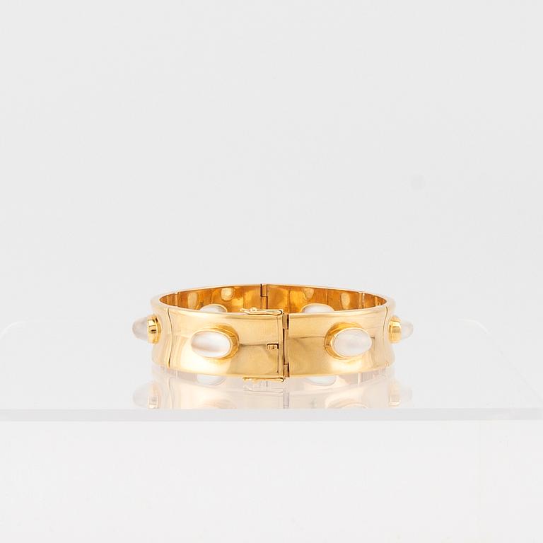 Armband 18K guld samt cabochonslipade månstenar Olle Torrestad Halmstad 1962.