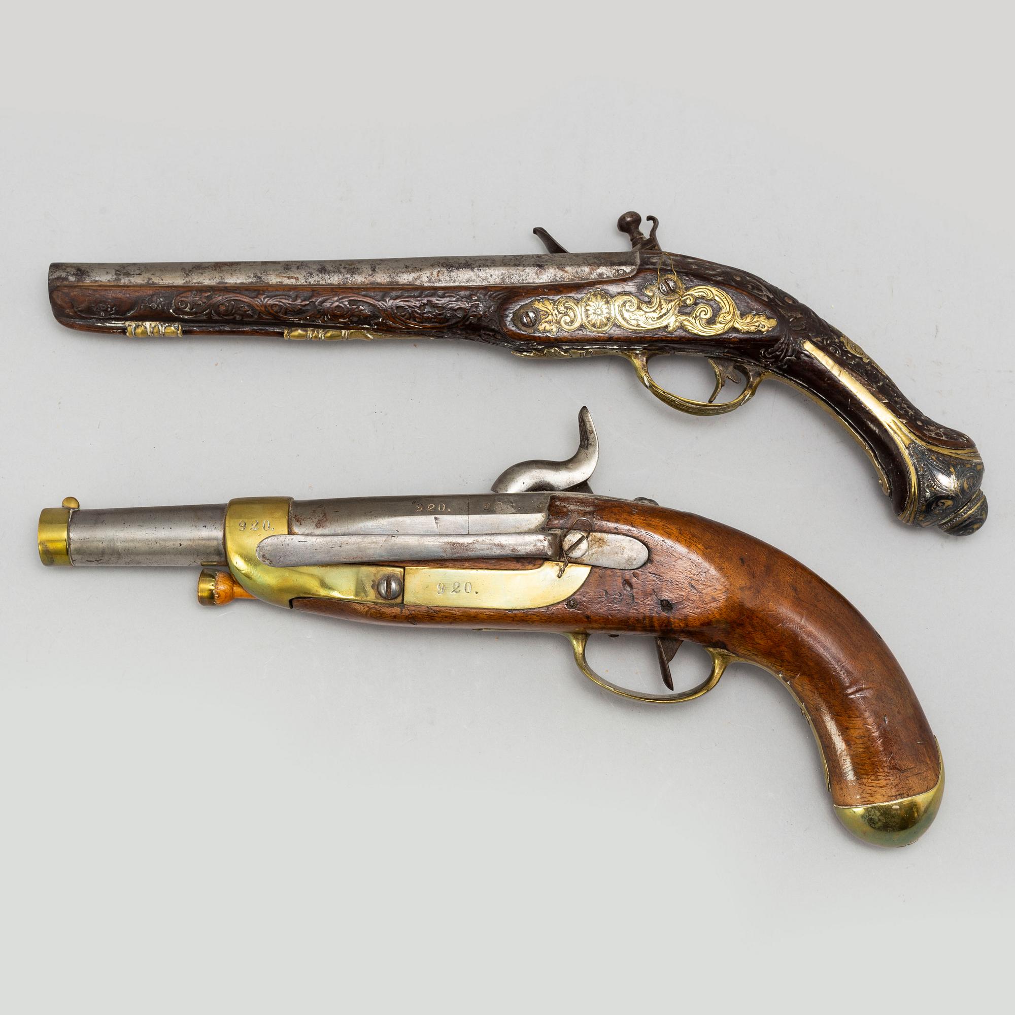 Two 19th Century pistols.