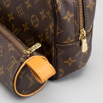 A LOUIS VUITTON TOILET POUCH and PENCIL CASE.