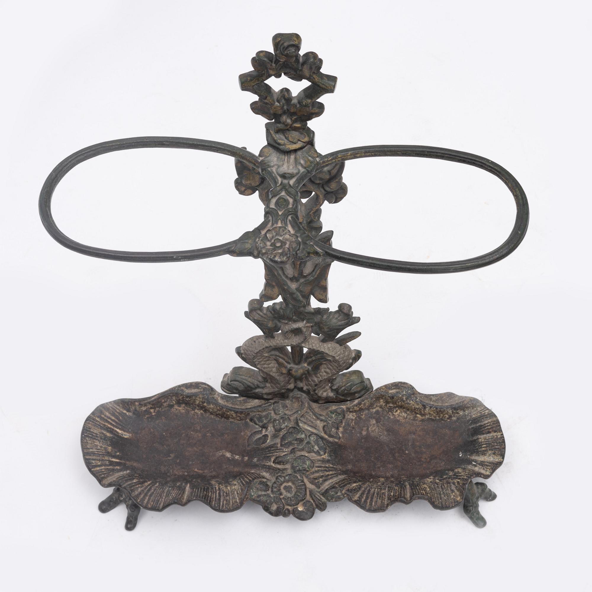 A umbrella stand, circa 1900.