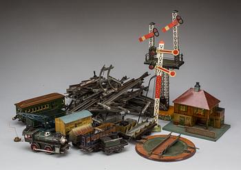 PARTI TÅG, RÄLS och TILLBEHÖR, 40 delar, bl.a Märklin och Bing, 1900-talets början.