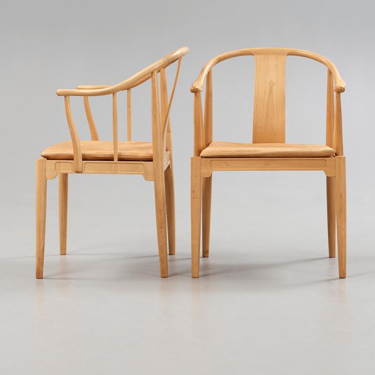 A pair of Hans J Wegner 'China chairs', Fritz Hansen, Denmark 1986-87.