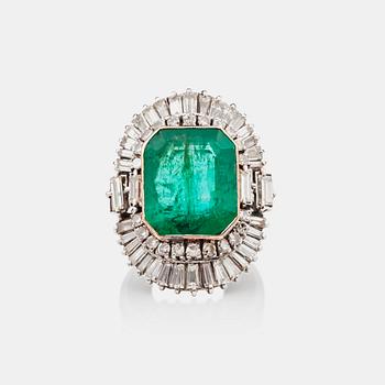 1210. An emerald-cut emerald and baguette-cut diamond ring.