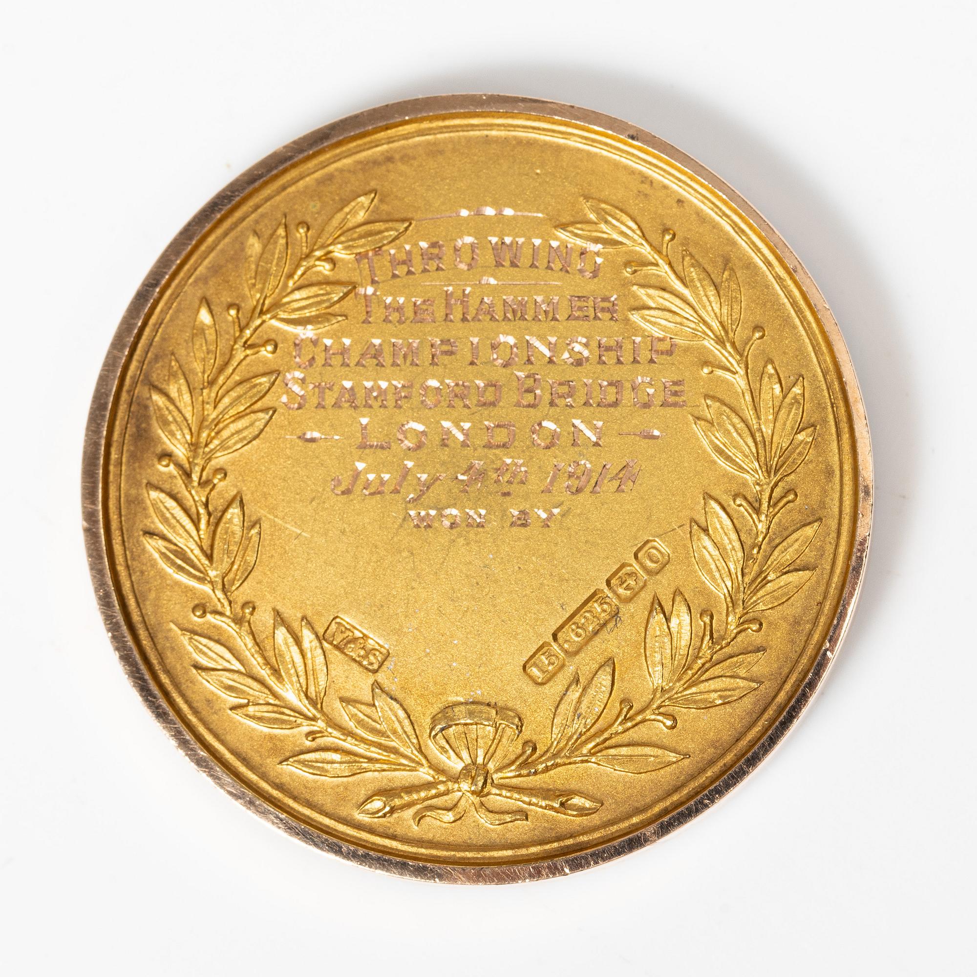 A medal, 15K gold, England, 1914.