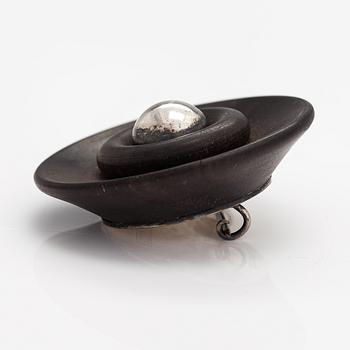 Kaija Aarikka, A necklace, a paid of earrings and a brooch made of silver and wood. Finland.