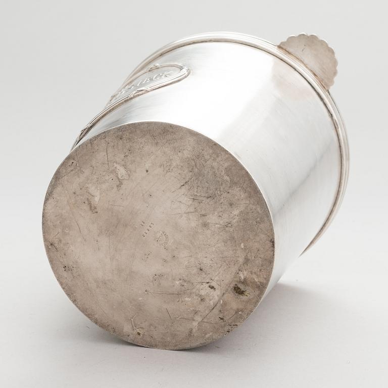 A silver plated brass Charles Heidsieck Champagne cooler.