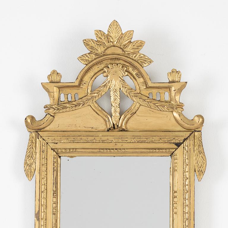 A Gustavian style mirror, late 19th Century.