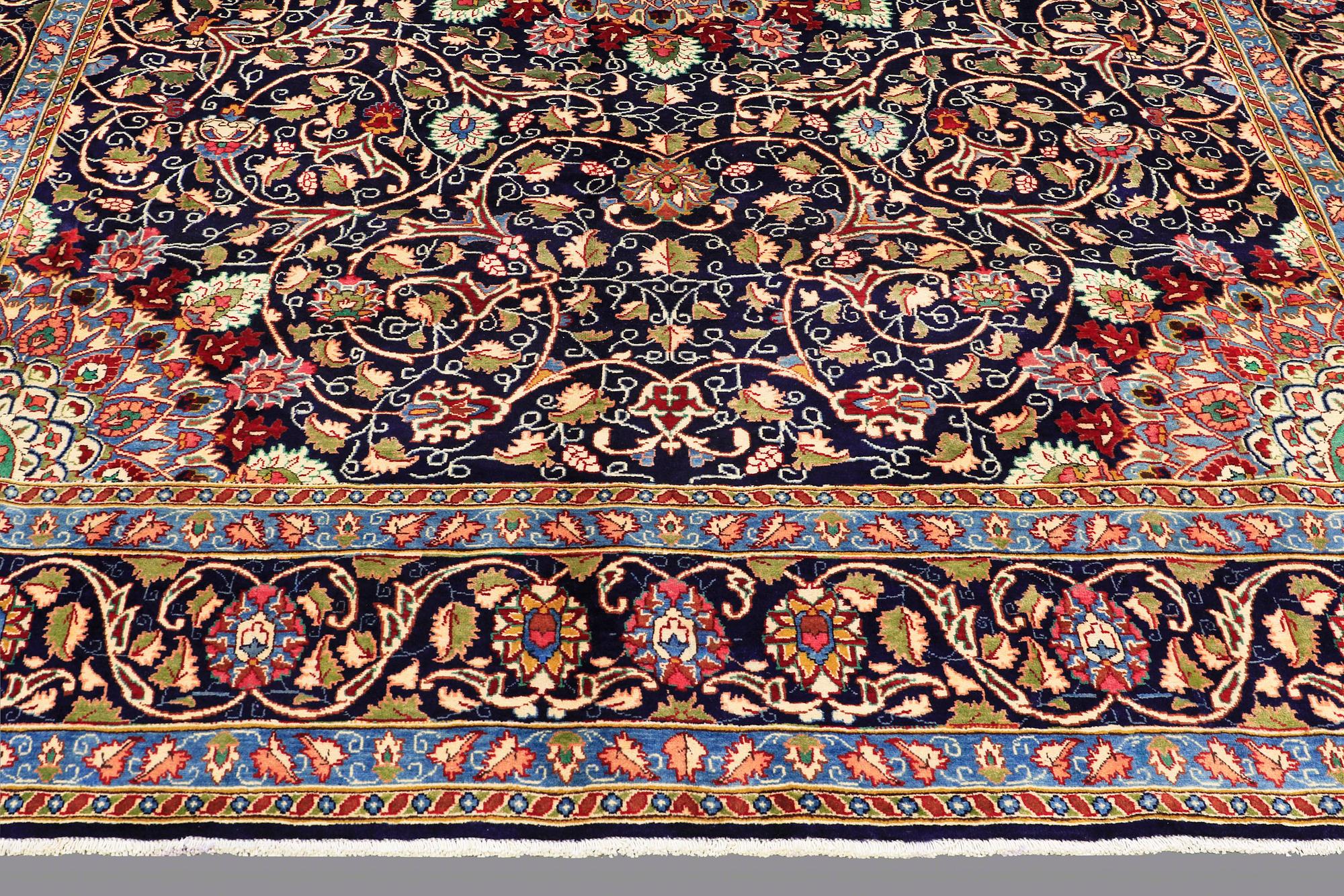 A carpet, Kashmar, signed, ca 390 x 295 cm.