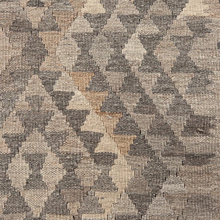 A Kilim carpet, ca. 262 x 176 cm.