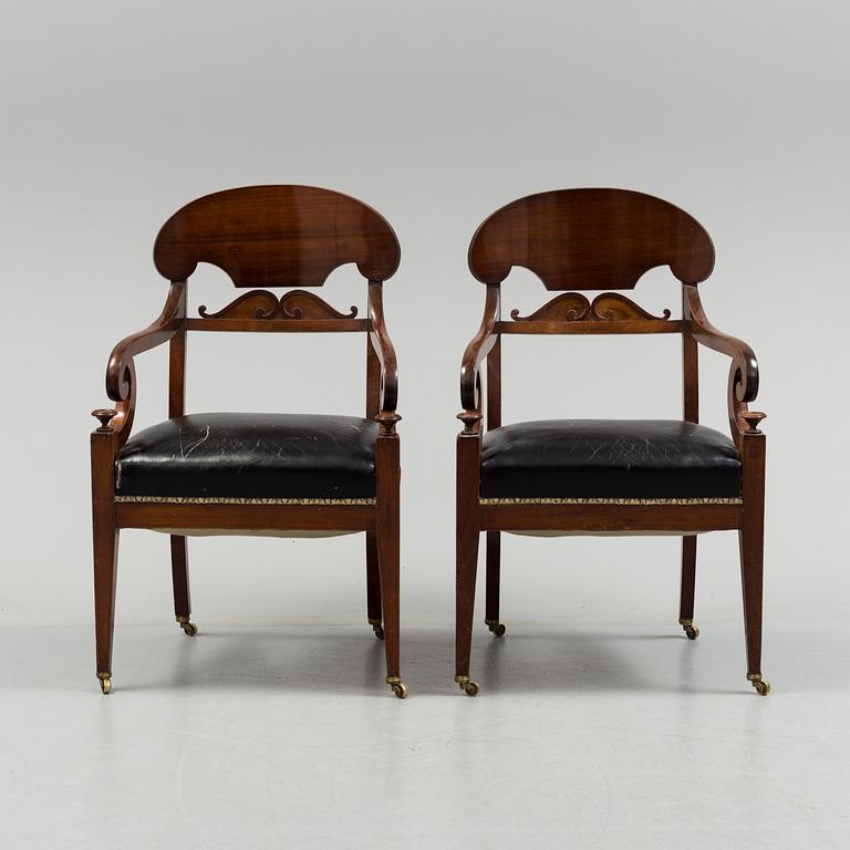 A pair of early 19th century mahogany  Empire armchairs, presumably from the Baltic countries.