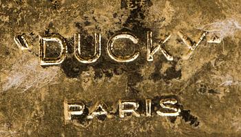 KAPSYLÖPPNARE, "Ducky Paris", 1900-talets andra hälft.