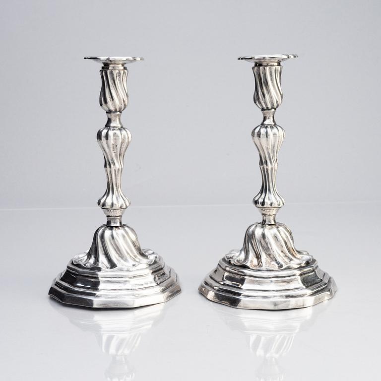 A pair of Italian 18th century rococo silver candlesticks, mark of Giovanni Battista Carron (active 1753-1778), Turin.