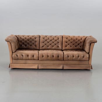 A DUX LEATHER SOFA.