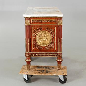 A Louis XVI style chest of drawers, second half of the 20th century.