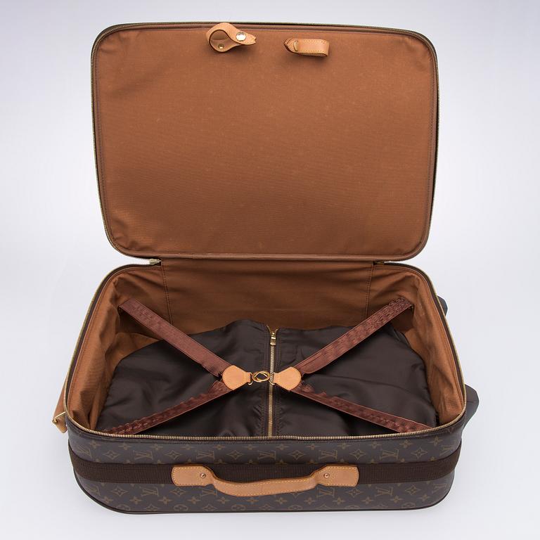 A Monogram Canvas Pégase 55 Suitcase with a Garment Cover.