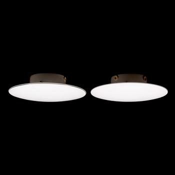 Arne Jacobsen, A pair of 1960's 'AJ-Eklipta' wall lamps, for Louis Poulsen/licensed manufacturer Orno, Stockmann.