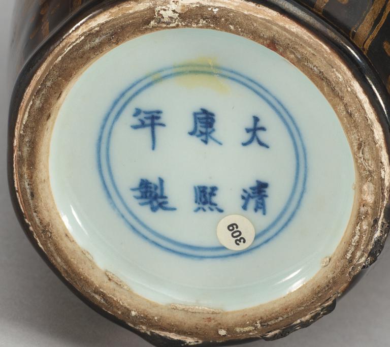 A gilt black vase, Qing dynasty, 18th Century, with Kangxis six character mark.
