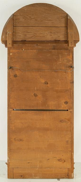 An Empire mirror from the first half of the 19th century.