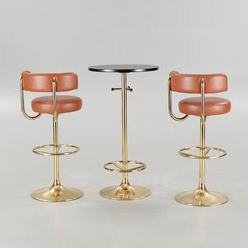 Two bar stools and a bar table by Börje Johanson, model "Jupiter", for Johanson design, second half of the 20th century.