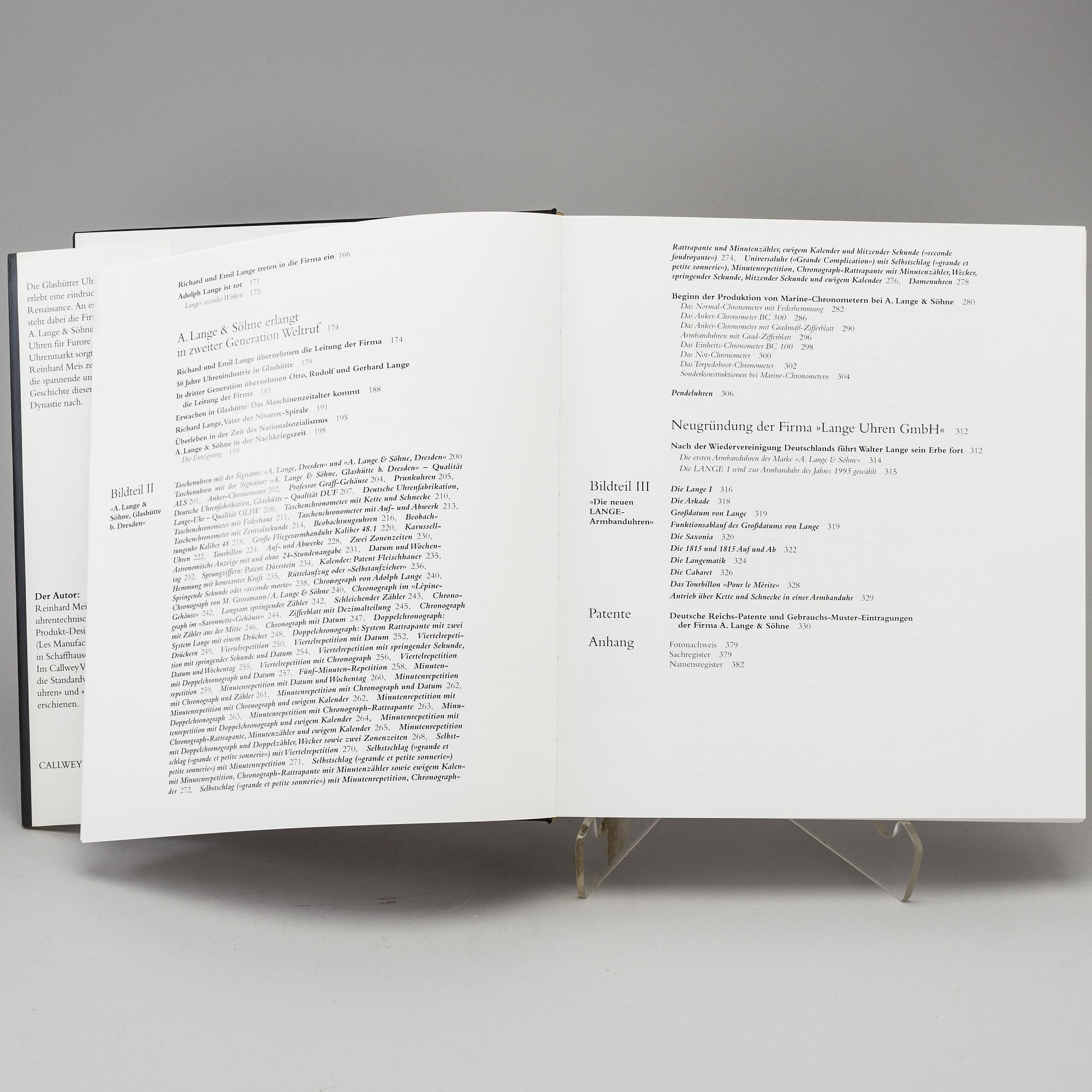 A set of 5 watch books.