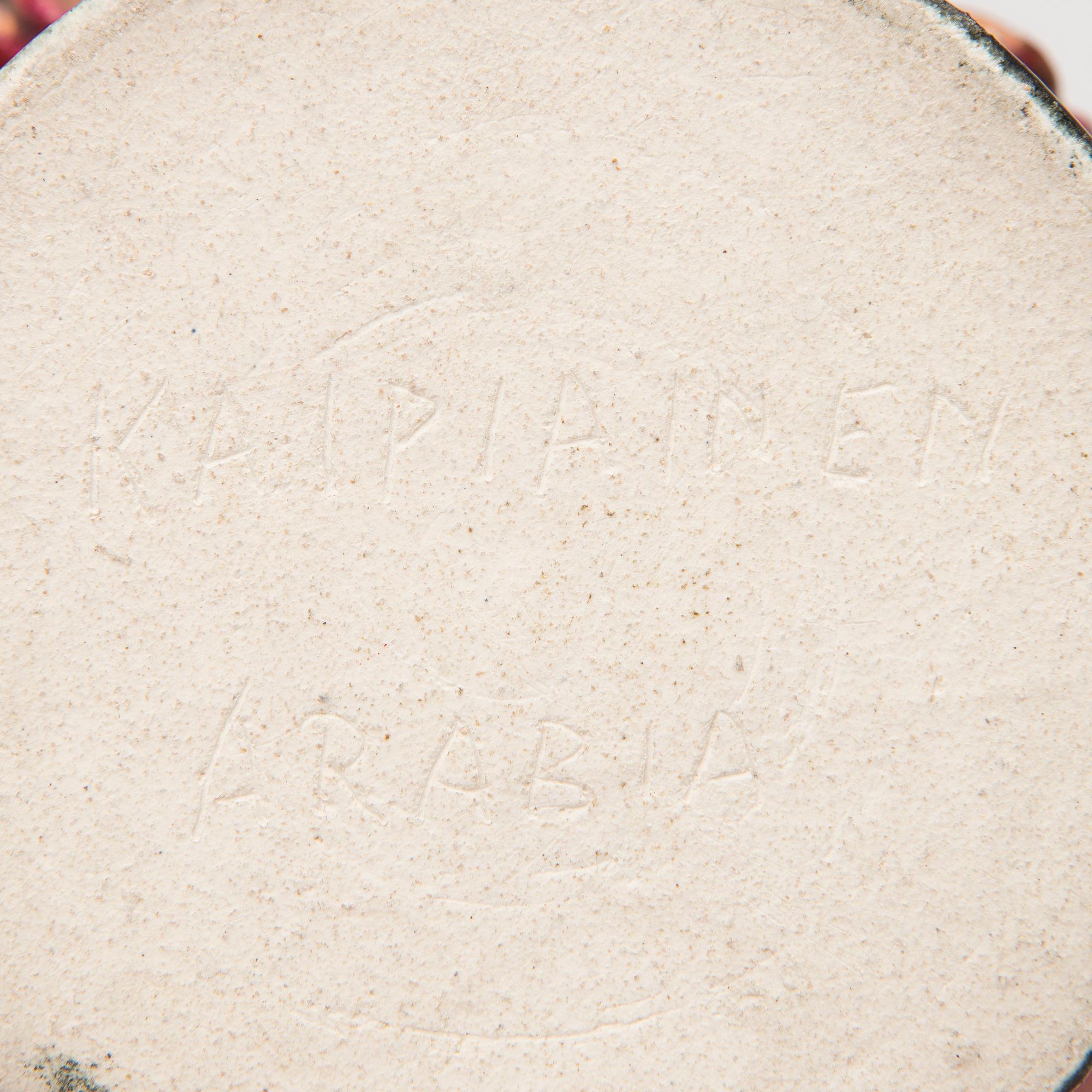 A stoneware sculpture, signed Kaipiainen Arabia.