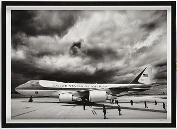 Brooks Kraft, "Storm clouds loom overhead as Air Force One and U.S. President George W. Bush arrive in Paris", 2003.