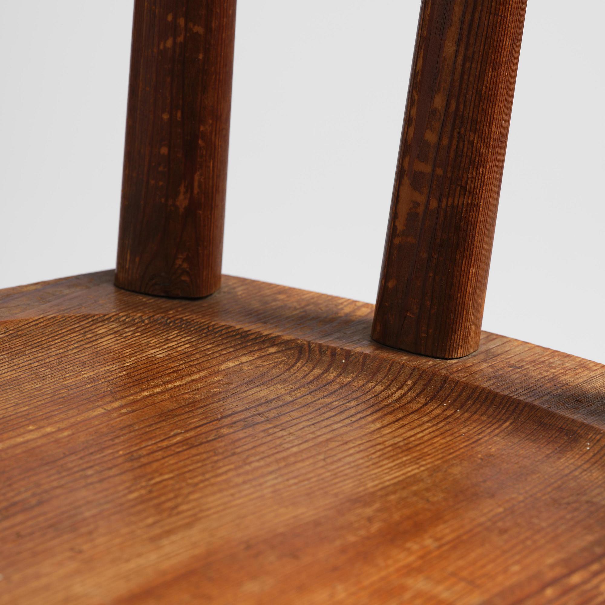 Axel Einar Hjorth, a set of three stained pine "Utö" chairs, Nordiska Kompaniet, Sweden, 1930s.