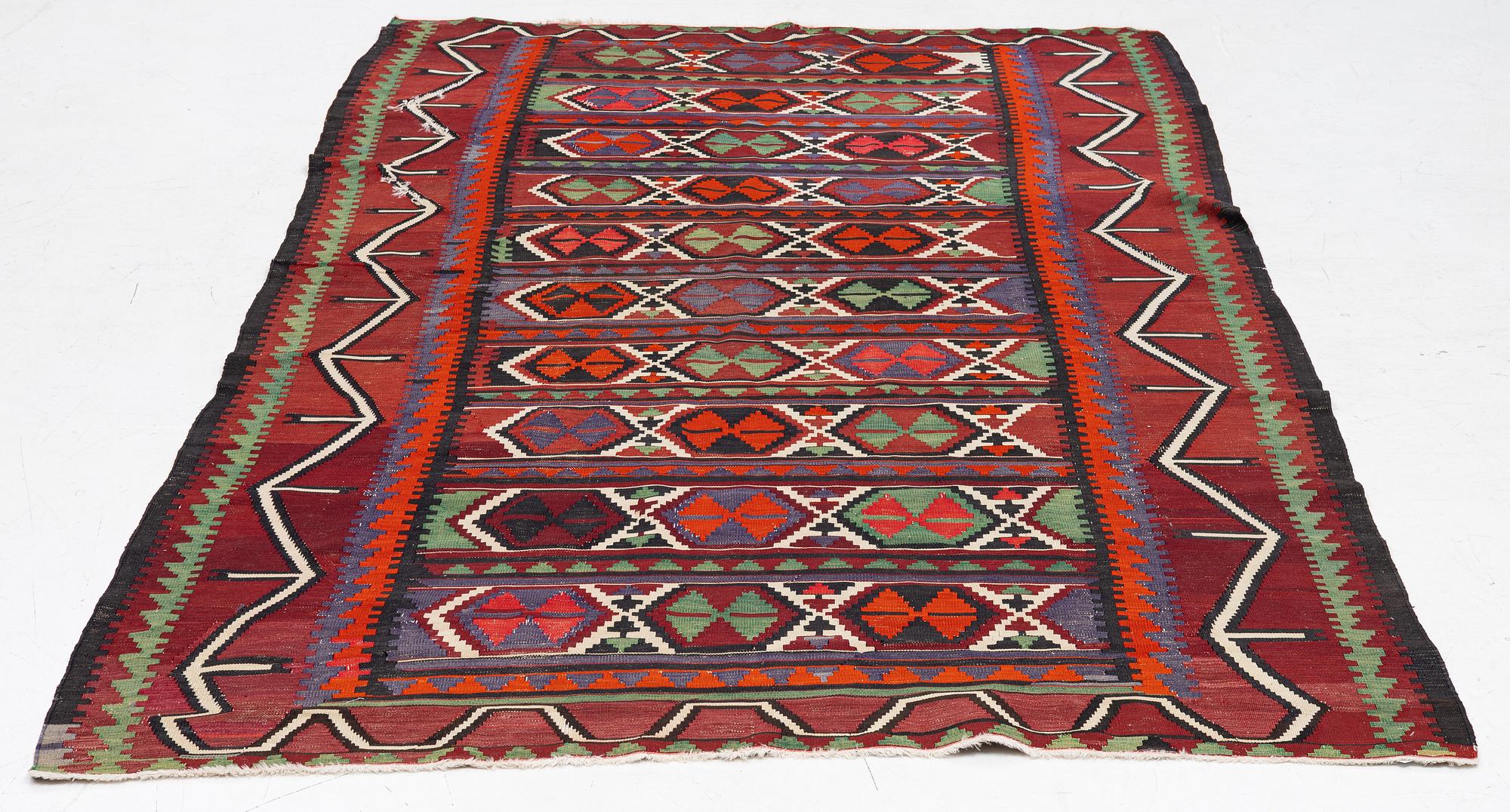 A Kelim carpet, c. 300 x 170 cm.