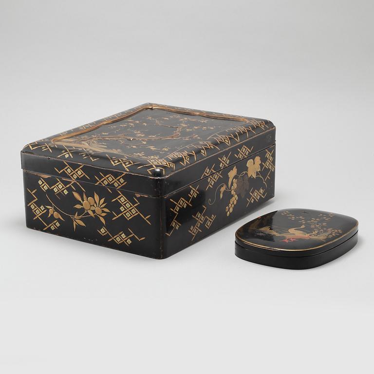 Two Japanese lacquered boxes with covers, circa 1900.