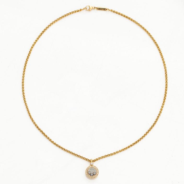 Chopard, an 18K gold 'Happy Diamonds' necklace with brilliant-cut diamonds.