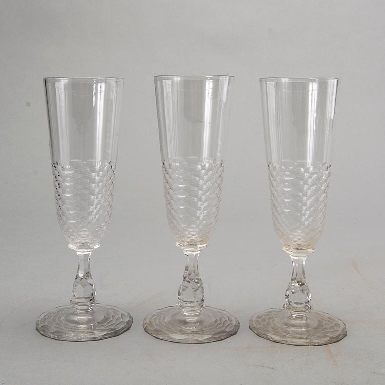10+7 Champagne glasses, decanter, cut decor. First half of 20th century.