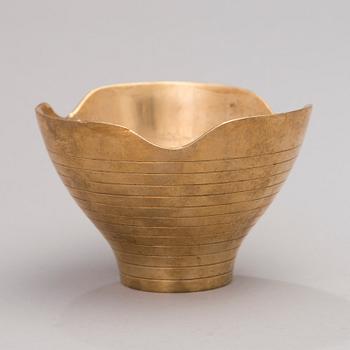 A mid-20th century bronze bowl stamped Oy Taito Ab.