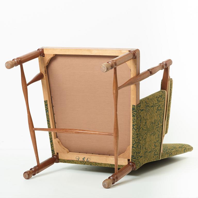 Josef Frank, a mahogany armchair, by Svenskt Tenn, Sweden, model 880.