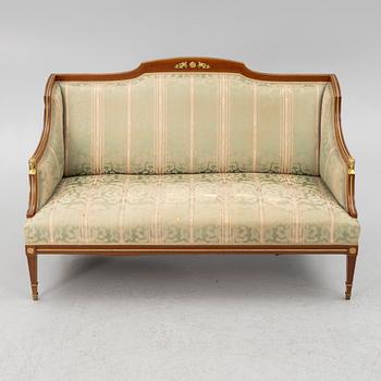 A sofa, two armchairs, four chairs and table, Empire style, 20th century.
