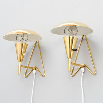 A pair of mid-20th-century wall lights / table lamps, model EV 57 for Itsu, Finland.