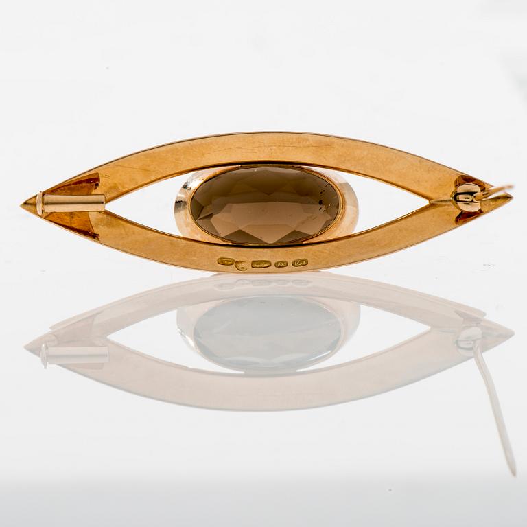 BROSCH, 14K guld, rökkvarts. Kupittaan Kulta 1963. Vikt ca 8,8 g.
