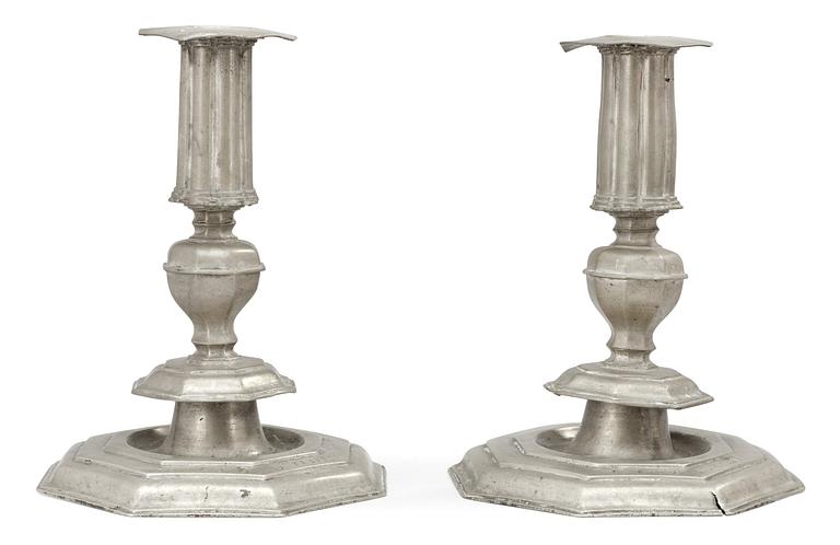 A pair of English Baroque 17th century pewter candlesticks marked by Richard Booth of York England.