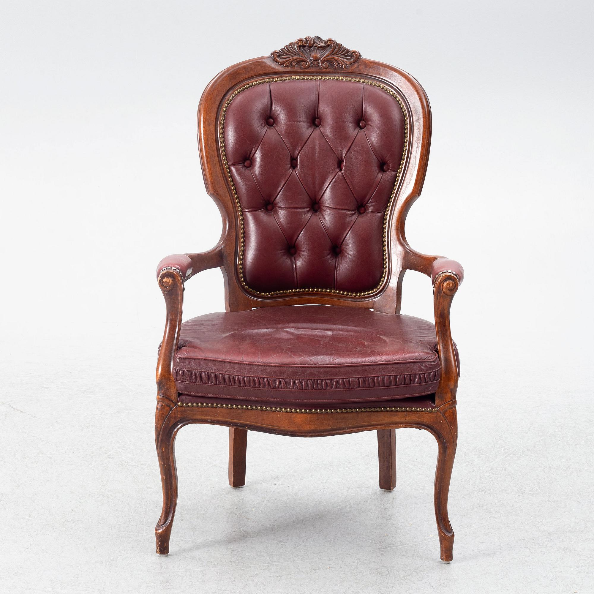 A Rococo style armchair, second half of the 20th Century.
