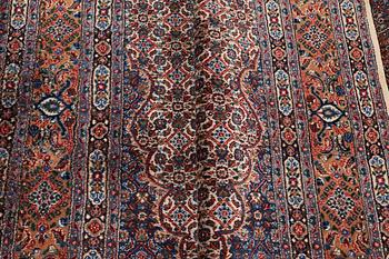 A carpet, Moud, signed, ca 385 x 268 cm.