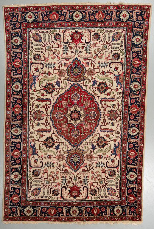 A CARPET, Old Tabriz, ca 300 x 198 cm.