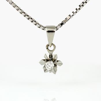 RING samt HALSBAND, ringen 23K guld, Umeå. Vikt 5,17 g. Halsband 18K vitguld med diamant, tot ca 0,09 ct. Vikt 5,47 g.