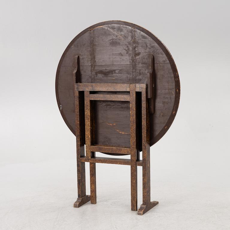 A folding table, 19th Century.