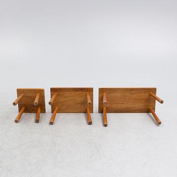 A set of three nesting oak tables or stools. second paert of the 20th century.